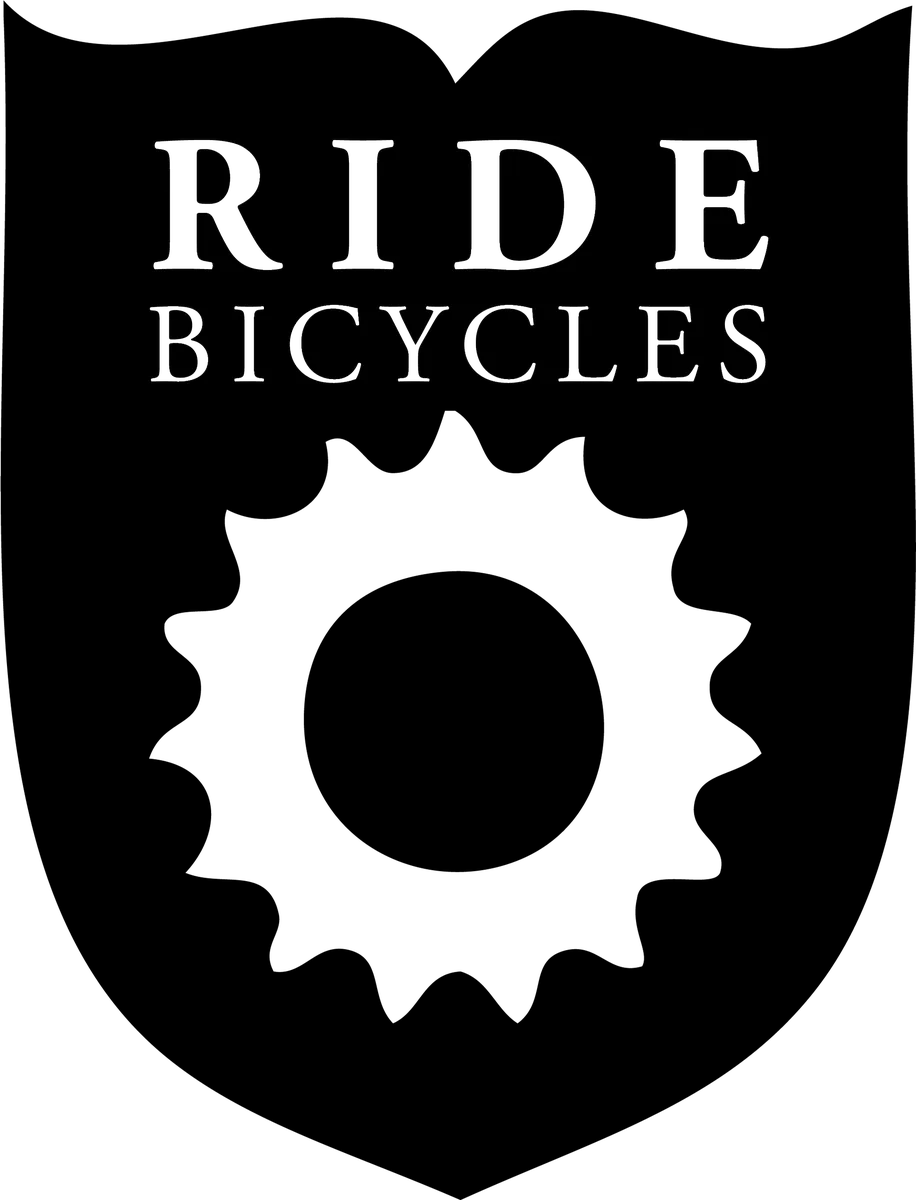 Ride Bicycles Sheild: bicycle t-shirt design with the words “RIDE BICYCLES”